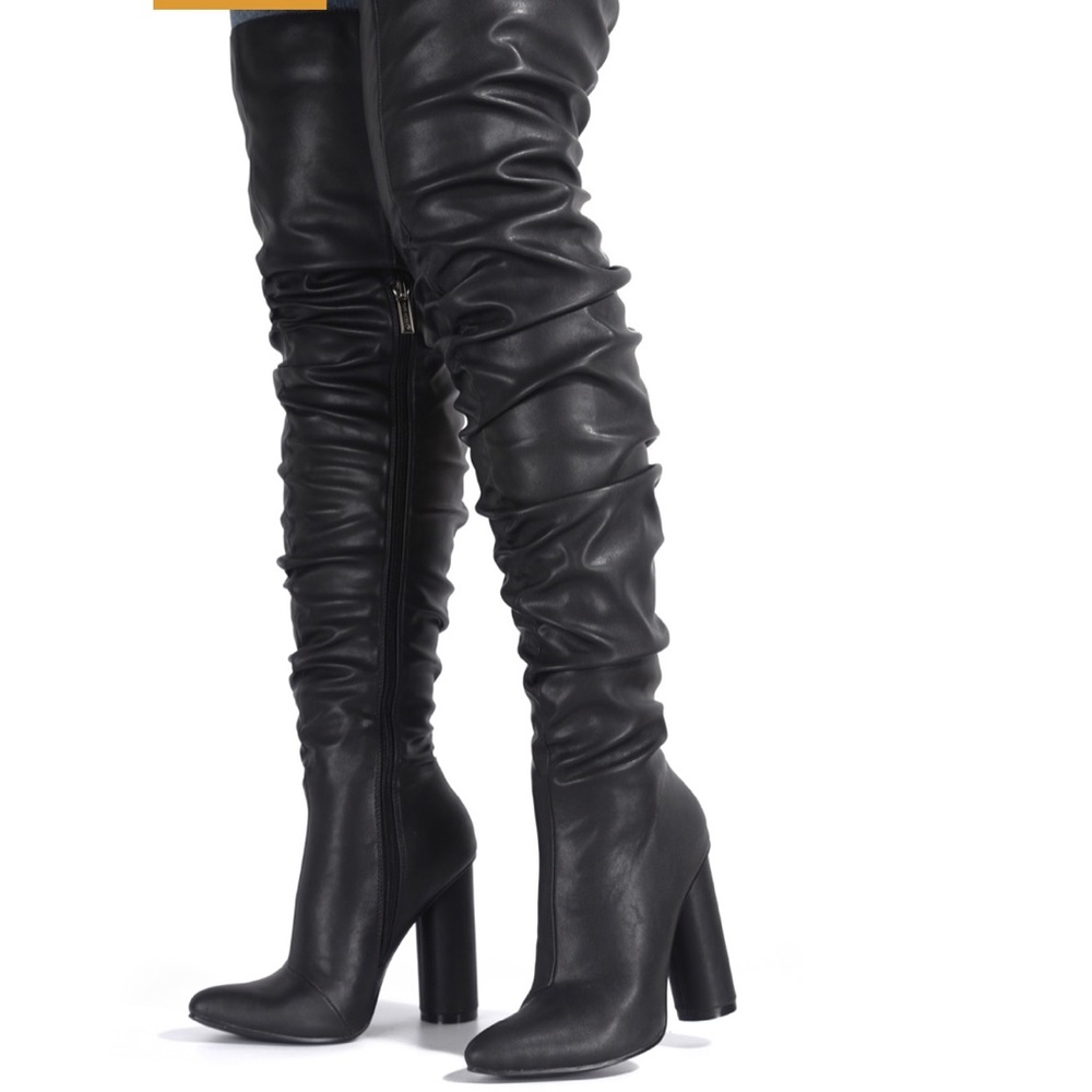 Black Thigh high vegan leather over the knees boots. Brand new never worn